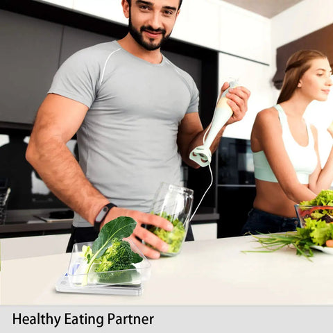 Person using hand blender near Ultra Dope Digital Kitchen Scale With 3000G Capacity And 0.1G Readout Six Units Grams Ounces Grains