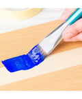 Person painting over Beige General Purpose Masking Tape Set 3 Rolls 2 Inches By 55 Yards Multi Surface Painter Tape with blue paint