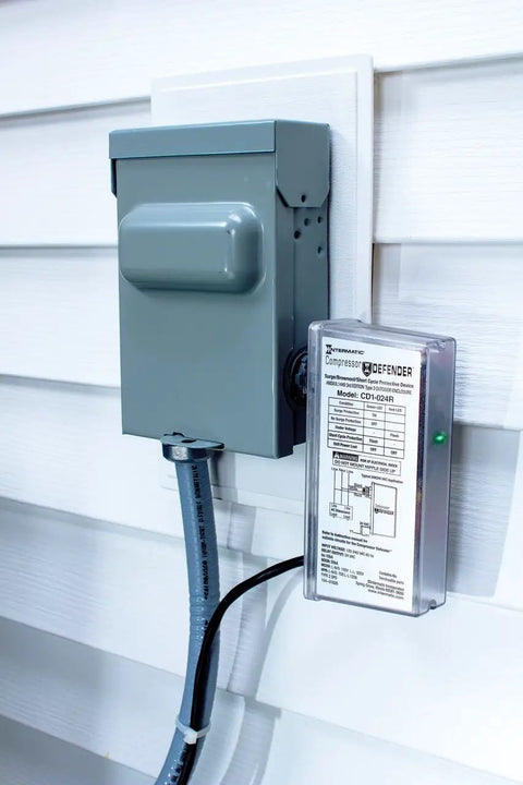 CD1-024R Compressor Defender Keeps Your Central Air Conditioners And Heat Pumps Running Smooth, mounted near electrical box