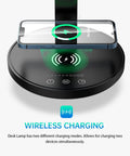 LED Desk Lamp With Wireless Charger And USB Port, 5 Color Modes And 5 Brightness Levels, Easy Touch Dimmer, Auto Off Timer 30 Or 60 Minutes, Eye Caring Desk Light For Home Office, Black showing wireless charging feature with smartphone