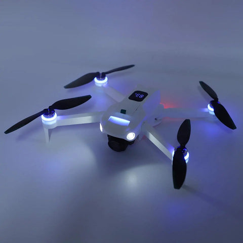 HD Dual Camera FPV Drone With Obstacle Avoidance, 5G WiFi RC Quadcopter With App Control And LCD Display, illuminated at night