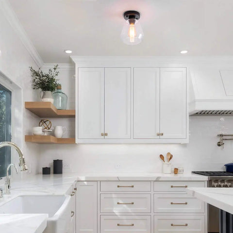Industrial Black Semi Flush Mount Ceiling Light With Clear Glass Shade in a modern white kitchen