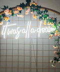 It Was All A Dream Neon Sign 3D LED Light With Personalization, adjustable brightness, displayed with floral decor, 65x11 cm