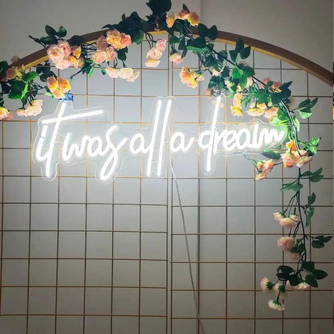 It Was All A Dream Neon Sign 3D LED Light With Personalization, adjustable brightness, displayed with floral decor, 65x11 cm