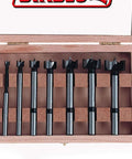 High Speed Steel Forstner Bit Drill Set For Precise Clean Holes In Any Wood Type Ideal For Pro Woodworking Projects One Quarter Inch To One Inch Diameter Bits With One Quarter To Three Eighths Inch Shank Three And A Half Inch Length Seven Piece Set displayed in wooden case