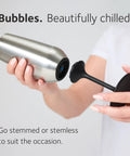 Top Tier Insulated Champagne Flute With Detachable Stem And Secure Lid Premium Stainless Steel Tumbler shown being held.