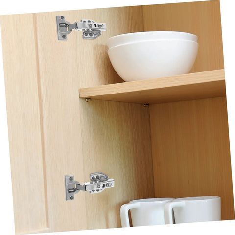 Rock Solid Stainless Steel Concealed Cabinet Hinges With Slick Silent Soft Close Self Closing Design For Kitchen Cupboards mounted on wooden shelf.