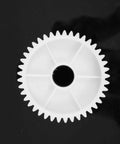 550 Gear Box Set For Kids Must Have Ride On Car Replacement Gears Kit large white gear on black background