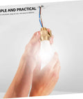 Hands installing bulb with Solid Brass Cord Grip For Edison Style Pendant Lights, Threaded Cable Locker Strain Relief