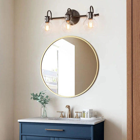 3 Light Black Vanity Light With Clear Glass Shades in modern farmhouse bathroom