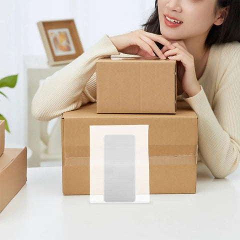 Woman with boxes and White EPE Foam Packing Bags 100 Pack For Shipping And Storage Protect Your Stuff Small Photo Frames And Crafts Trimable Foam Pouches