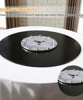 Heavy Duty Tempered Glass Lazy Susan Rolls Smooth With 360 Swivel, Giant Round Turntable Plate on table with enlarged base design.