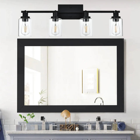 4 Light Track Lighting Kit Matte Black With Pivoting Heads over bathroom mirror, clear glass shades visible