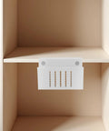 Clamp On White Steel Laptop Stand With Ventilated Cooling Fan And Sleek Cable Routing For Under Desk Mount Quick No Drill Installation displayed in minimal shelving.