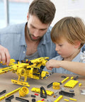 Adult and child assembling yellow prop plane from 2-In-1 Dump Truck And Propeller Plane Build Kit For Kids Aged 5 To 12, 361+ Pcs DIY STEM Construction Toy