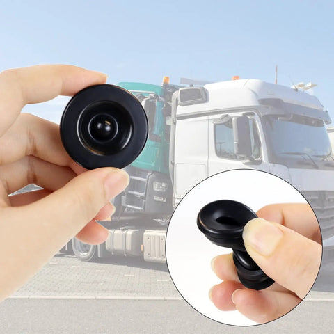 Close-up of hand holding 4 Pack Trailer Hub Dust Caps Rubber Grease Plugs For Ez Lube Style Hubs 85 1 Cap Camper Trailer Wheel Caps