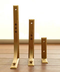 Heavy Duty Shelf Brackets Wall Mount Kickass Brass Metal Supports in three sizes for sturdy floating shelves