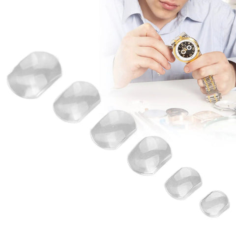 Six Piece Watch Calendar Magnifier Set With Convex Bubble Lenses, watchmaker using tools and assorted magnifiers on table
