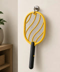 Next Level Handheld Bug Zapper Racket with Batteries Included hanging on wall, showing yellow frame and black handle