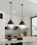Solid Wood Matte Black Pendant Lights Three Pack For Kitchen Island And Dining Room Modern Ceiling Hanging Lamps For Bar And Coffee Bar Minimalist Wood And Metal Design Warm Ambience over a modern kitchen island with measurements visible