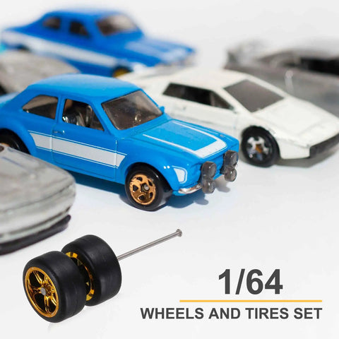 Four Pack 1 64 Scale Wheel And Tire Set For RC Diecast Cars with gold six spoke rims and axle next to blue diecast car