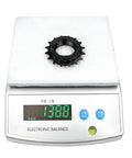16T Freewheel For Single Speed Bikes One Half By One Eighth Inch Chain Compatible Threaded Type Replacement Part With 34.1mm Inner Diameter And 1.375mm Pitch Built From Beefy High Tensile Steel For Smooth Shifts And Easy Install Black on electronic scale