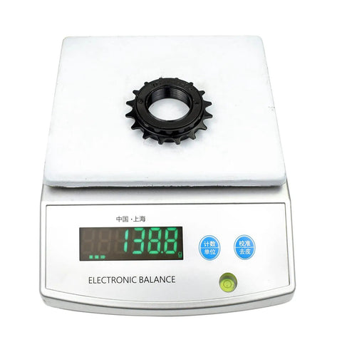 16T Freewheel For Single Speed Bikes One Half By One Eighth Inch Chain Compatible Threaded Type Replacement Part With 34.1mm Inner Diameter And 1.375mm Pitch Built From Beefy High Tensile Steel For Smooth Shifts And Easy Install Black on electronic scale