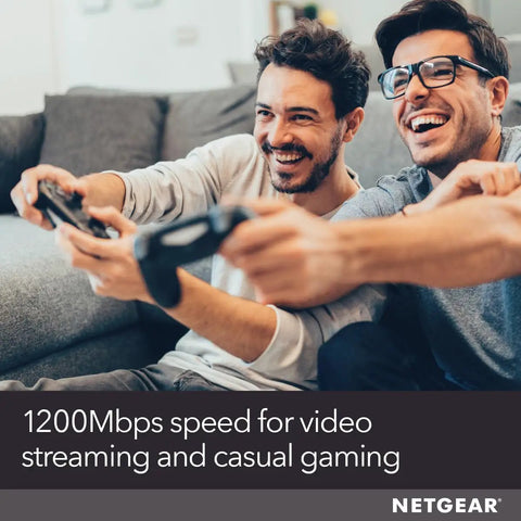 Two people gaming on a couch with WiFi Range Extender With AC1200 Dual Band, Extends Coverage Up To 1500 Sq Ft, FastLane Technology