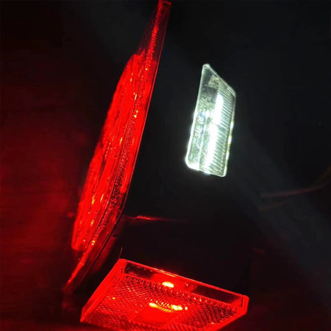 LED Trailer Light Kit 12V Submersible Tail Marker Lights With Wiring Harness For Boat Car Truck RV Utility Snowmobile Stop Turn Reverse DOT Certified Road Ready showcasing red and white lights in darkness