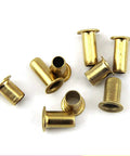 Copper Hollow Rivets Kit For Circuit Boards M0.9 M1.3 M1.5 M1.7 Mixed Sizes For PCB Nails Grommet Tool on white surface