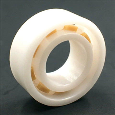 R188 full ceramic bearing with white outer race and orange ball retainers, 1/4 in x 1/2 in x 3/16 in
