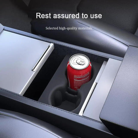 Slick White Silicone Cup Holder Tray For Tesla Model Y 2025 Center Console with a soda can securely held.