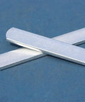 Crossed gym-grade heavy duty metal plates 5.9x0.98 inch for weight and leg guard loading, fitness accessory