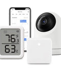 Pan Tilt 2K Indoor Camera With Thermometer Hygrometer And Hub Mini All In One Smart Home Surveillance Kit Environmental Monitoring And Automated Control For Comfort And Safety displayed with smartphone.