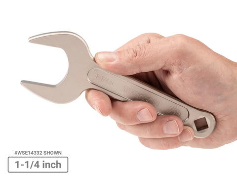Hand holding 1-1/4 inch wrench from Service Wrench Set With Modular Organizers, 15-Piece SAE Wrench Kit From 3/4 to 1-5/8 Inch