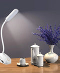 Clip On Desk Lamp With Flexible Gooseneck 7W 2600mAh Battery Operated Rechargeable Reading Light next to teapot on table