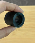 Heavy Duty Motorcycle Sprocket Tensioner Rubber Sliders For Slick Chain Tracking And Awesome Ride Vibes Riders Grab This 20 Pack Idler Pulley Guide Cover Kit For Street Bikes shown in hand.