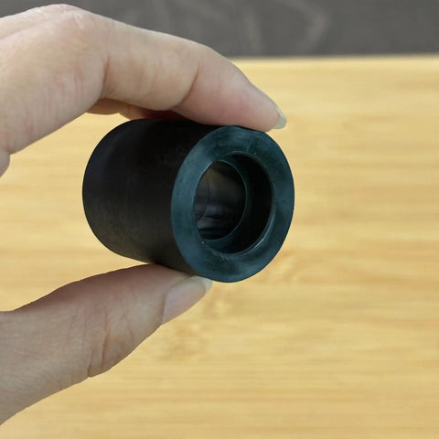 Heavy Duty Motorcycle Sprocket Tensioner Rubber Sliders For Slick Chain Tracking And Awesome Ride Vibes Riders Grab This 20 Pack Idler Pulley Guide Cover Kit For Street Bikes shown in hand.