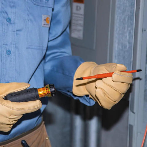 Person holding Insulated 8 In 1 Screwdriver Set With Interchangeable Blades For Electrical And General Repairs