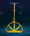 Front view of No Sweat Heavy Duty Drum Dolly For 55 Gallon Steel Barrels Reinforced Rolling Cart with blue handle and red wheels.