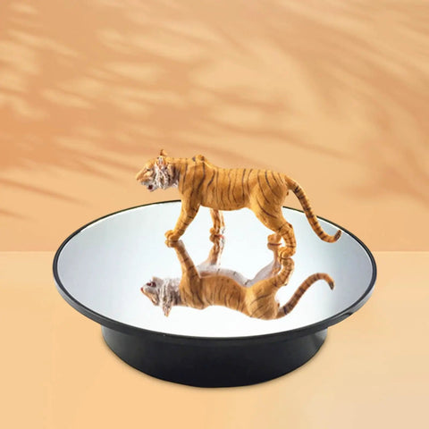 Premium Electric Rotating Turntable Display Stand With Adjustable Speeds For Jewelry Makeup And Ornaments Black Base Mirror, showcasing a tiger figurine.