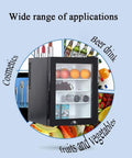 Compact Upright Mini Freezer Featuring A Sleek Black Glass Door With Energy Efficient Cooling That Runs Dead Quiet At Twenty Eight Decibels Ideal For Dorms Offices Or Small Bedrooms With Plug And Play Design showing various items inside.