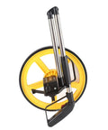 Tyenaza Mechanical Range Measuring Wheel 9999ft 10cm Accuracy Distance Measuring Roller with yellow wheel and metallic handle.