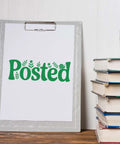 "Posted" stamped in green on paper with Go To Small Duo Hand Stamp For Mail And Parcels near a stack of books and a camera.