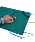 Pro Grade Anti Static Work Mat With Wrist Strap And Grounding Cord For Electronics Repair And PC Building 11 8 By 15 7 Inches ESD Safe Bench Pad With Surface Resistivity 106 To 109 Ohms For Peak Static Protection, showing mat and wrist strap in use.