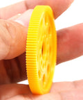 Close-up of 64P 96T RC Car Spur Gear in hand, lightweight, high precision plastic gear for 1/10 on-road RC cars, enhancing acceleration.