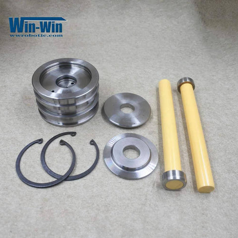 Waterjet piston assembly parts: two yellow rods, metal discs, washers and circlips; Win-Win logo.