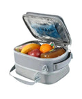 Leak Proof Expandable Lunch Bag With Ice Walls Keeps Your Lunch Fridge Cold Up To Six Hours Heavy Duty with fruits inside.