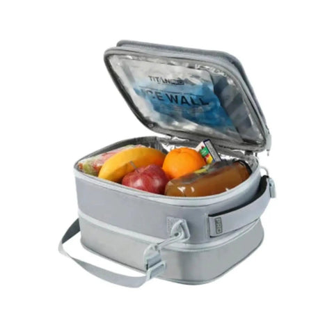 Leak Proof Expandable Lunch Bag With Ice Walls Keeps Your Lunch Fridge Cold Up To Six Hours Heavy Duty with fruits inside.
