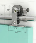 Close-up of the 6.6 Ft Sliding Barn Door Hardware Kit Heavy Duty Top Mount Stainless Steel Track on a turquoise door.